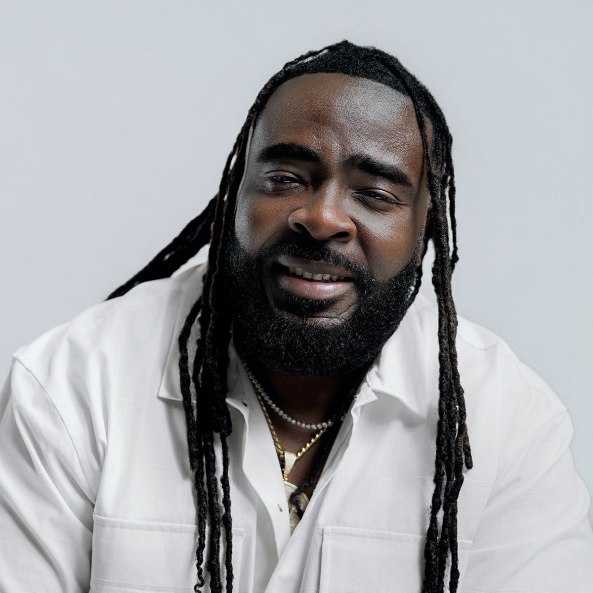 Monty G portrait in a white shirt